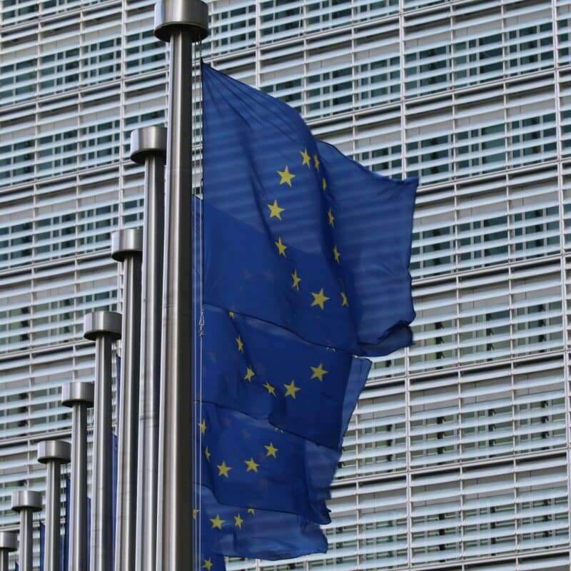 📷 Ciertos impulsan el cumplimiento de la IA ética en Europa 4 Photo of EU flags as EU-funded initiative CERTAIN aims to drive ethical AI compliance in Europe amid increasing regulations like the EU AI Act.