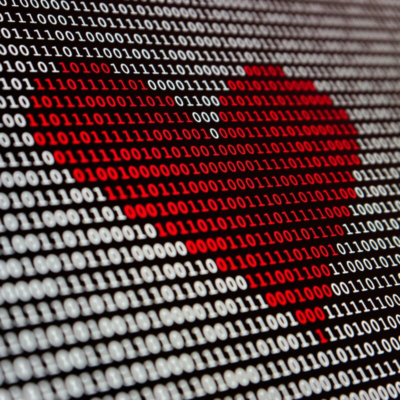 📷 El modelo de voz de IA reduce los errores de transcripción de atención médica 5 Red heart made out of binary digits illustrating the launch of Nova-3 Medical by Deepgram, an AI speech-to-text (STT) model tailored for transcription in the demanding environment of the healthcare sector.